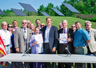 Governor Sununu and officials at bill signing ceremony